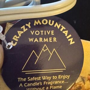 BRAND New Crazy Mountain candle warmer
Never used